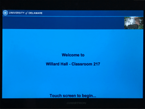 Image of classroom touch panel that shows a welcome message that reads "Welcome to Willard Hall - Classrom 217"
